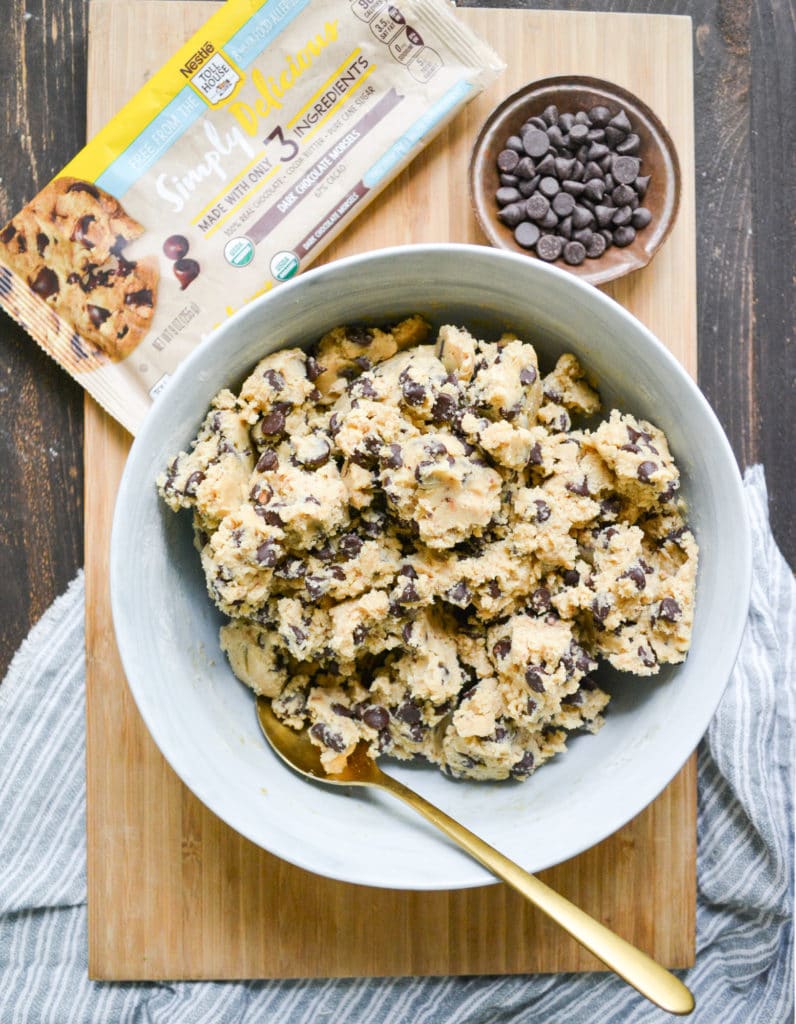 Mixed cookie dough made without brown sugar in a bowl with a gold spoon
