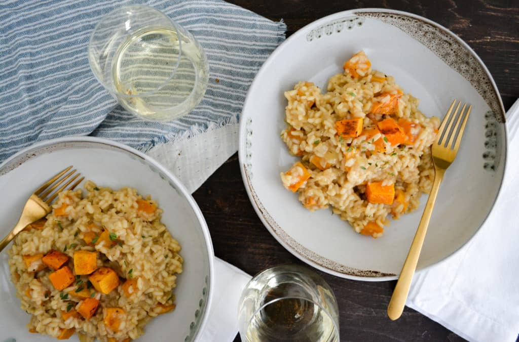 butternut squash risotto with glass of wine