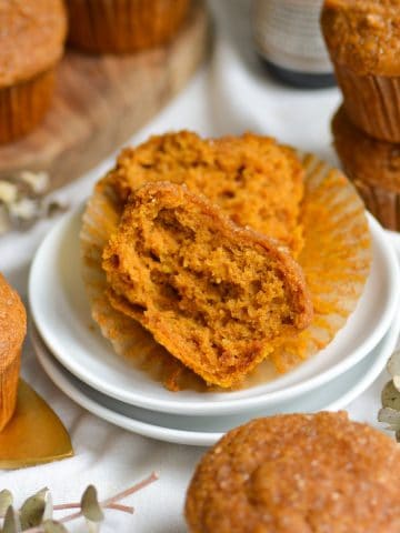 Vegan Pumpkin Muffin cut in half to show the interior.