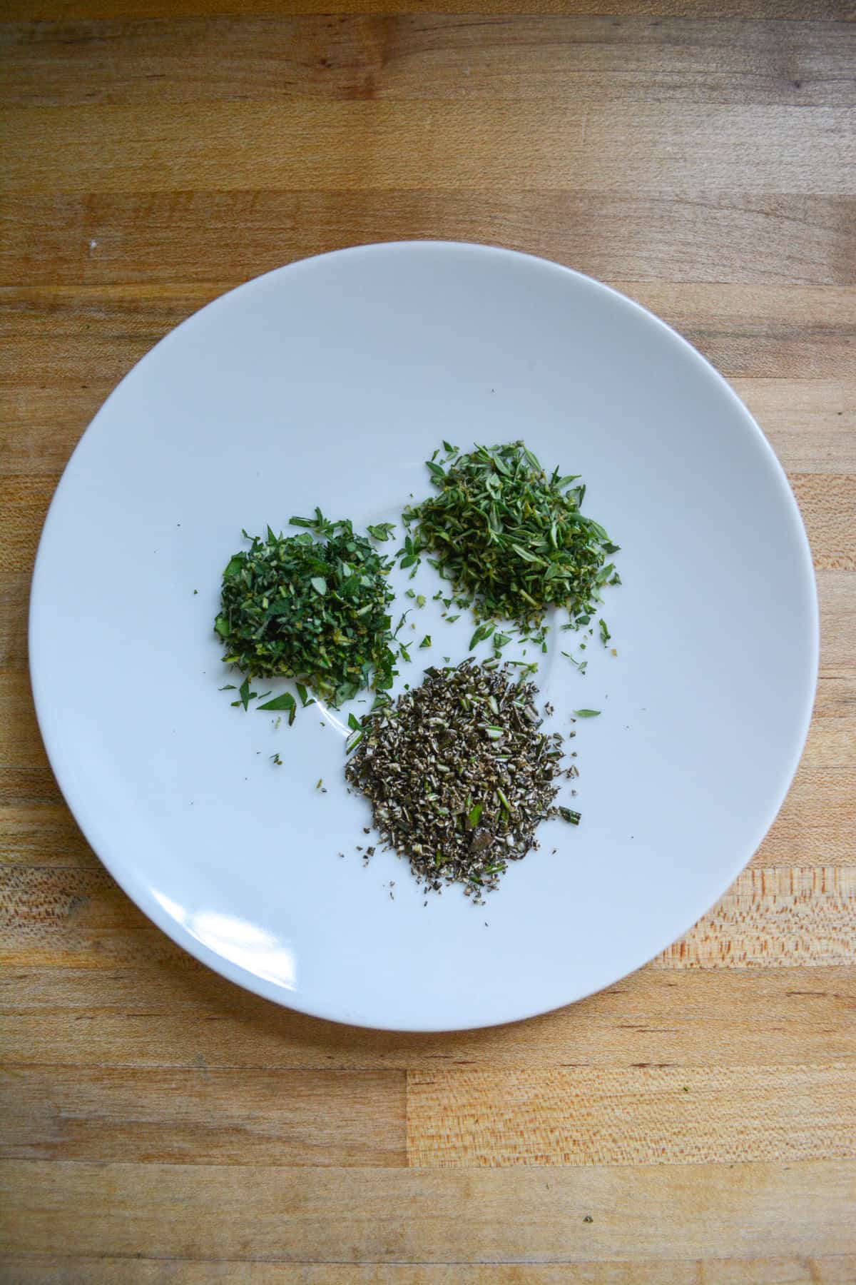 Finely chopped herbs on a plate