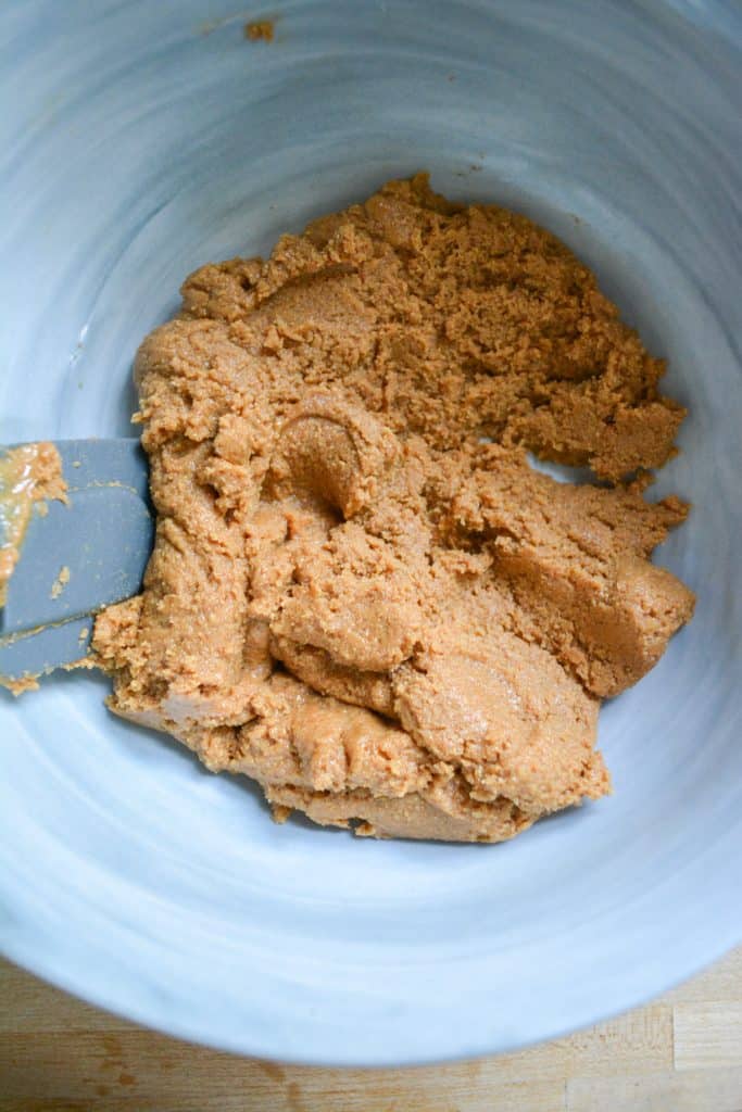 peanut butter and brown sugar creamed together in a marble bowl