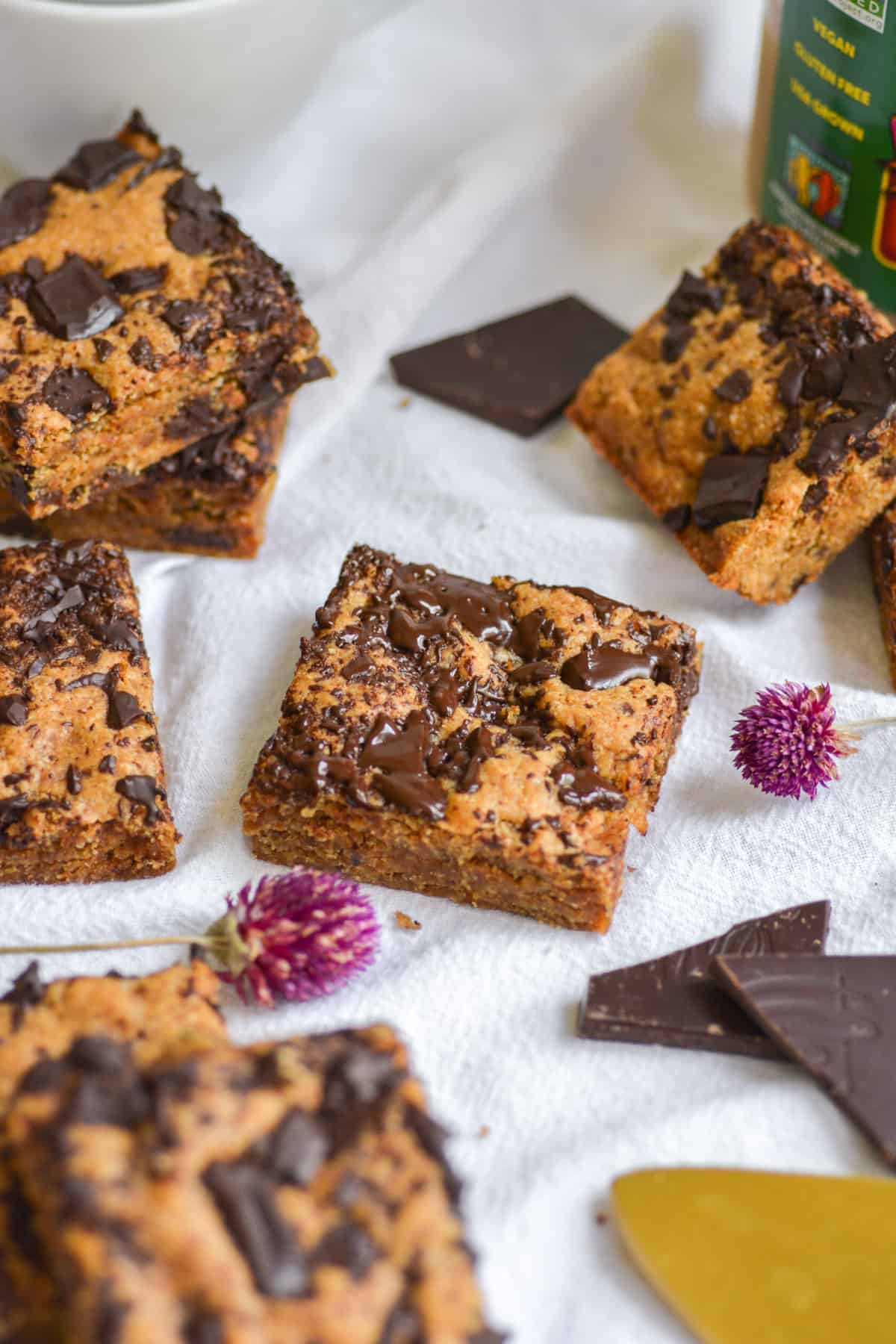 Vegan Gluted Free peanut butter blondies on a white cloth