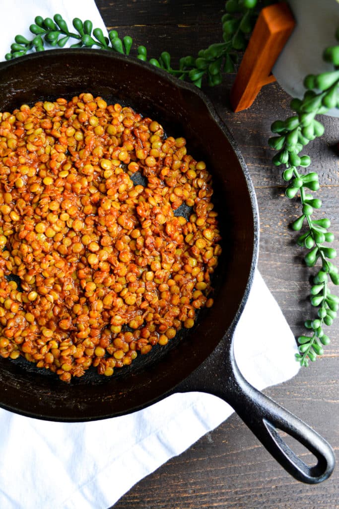 Quick + Smoky Barbecue Lentils in a cast iron pan