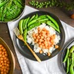 Plates of rice with chickpeas and snap peas
