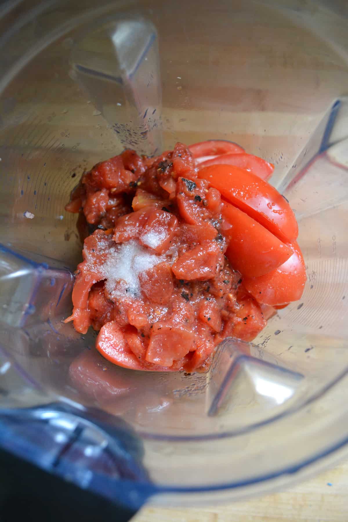 Roma tomatoes and fire roasted tomatoes added into the blender.