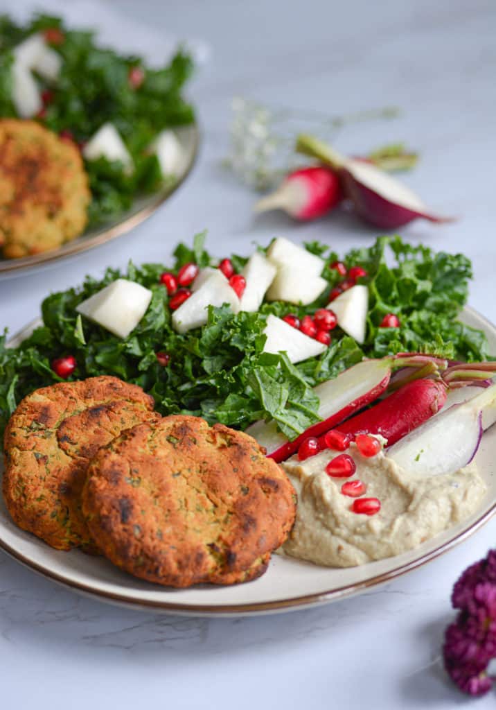 Plate of falafel with baba ganoush and salad