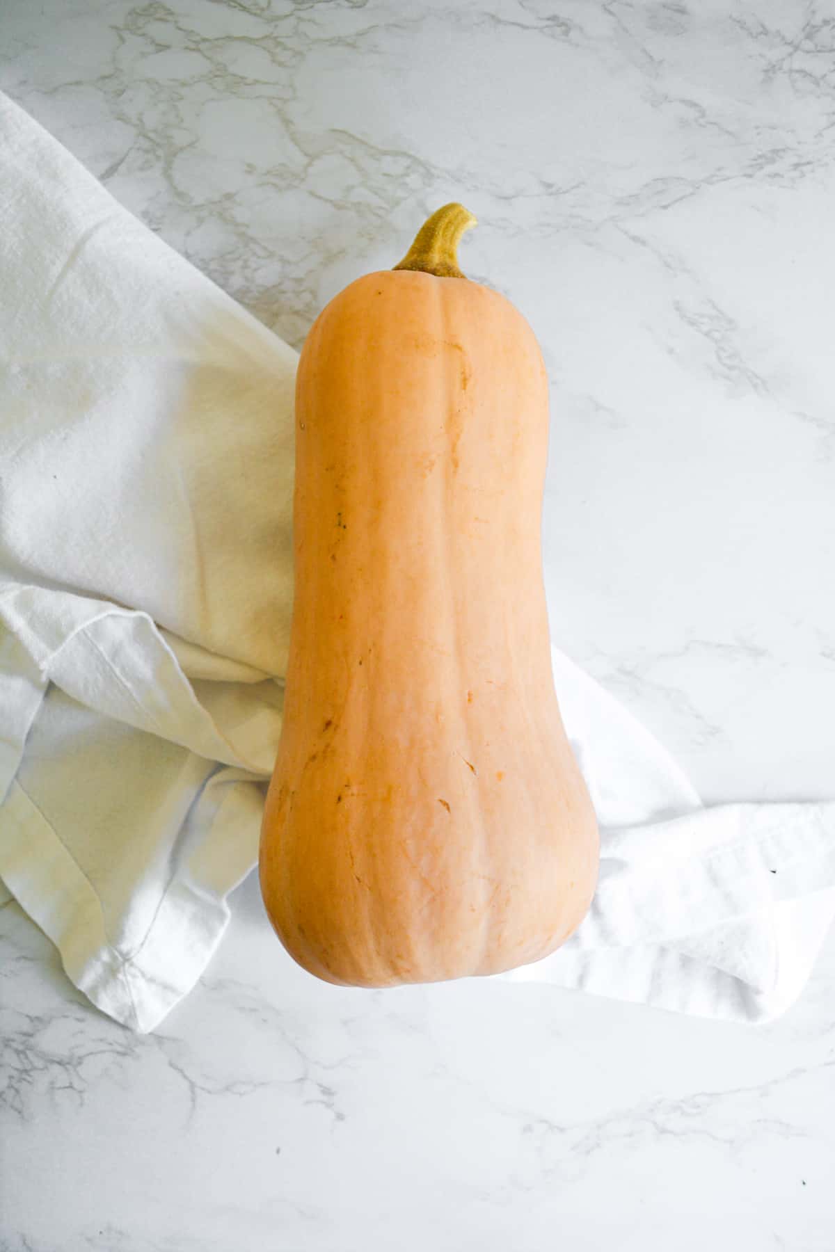 Butternut squash on a marble board