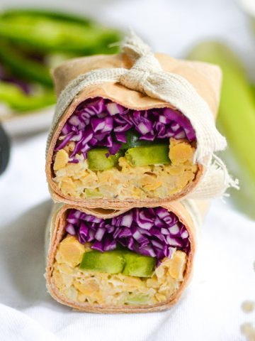 Lanscape of a Ranch chickpea salad wrap with purple cabbage