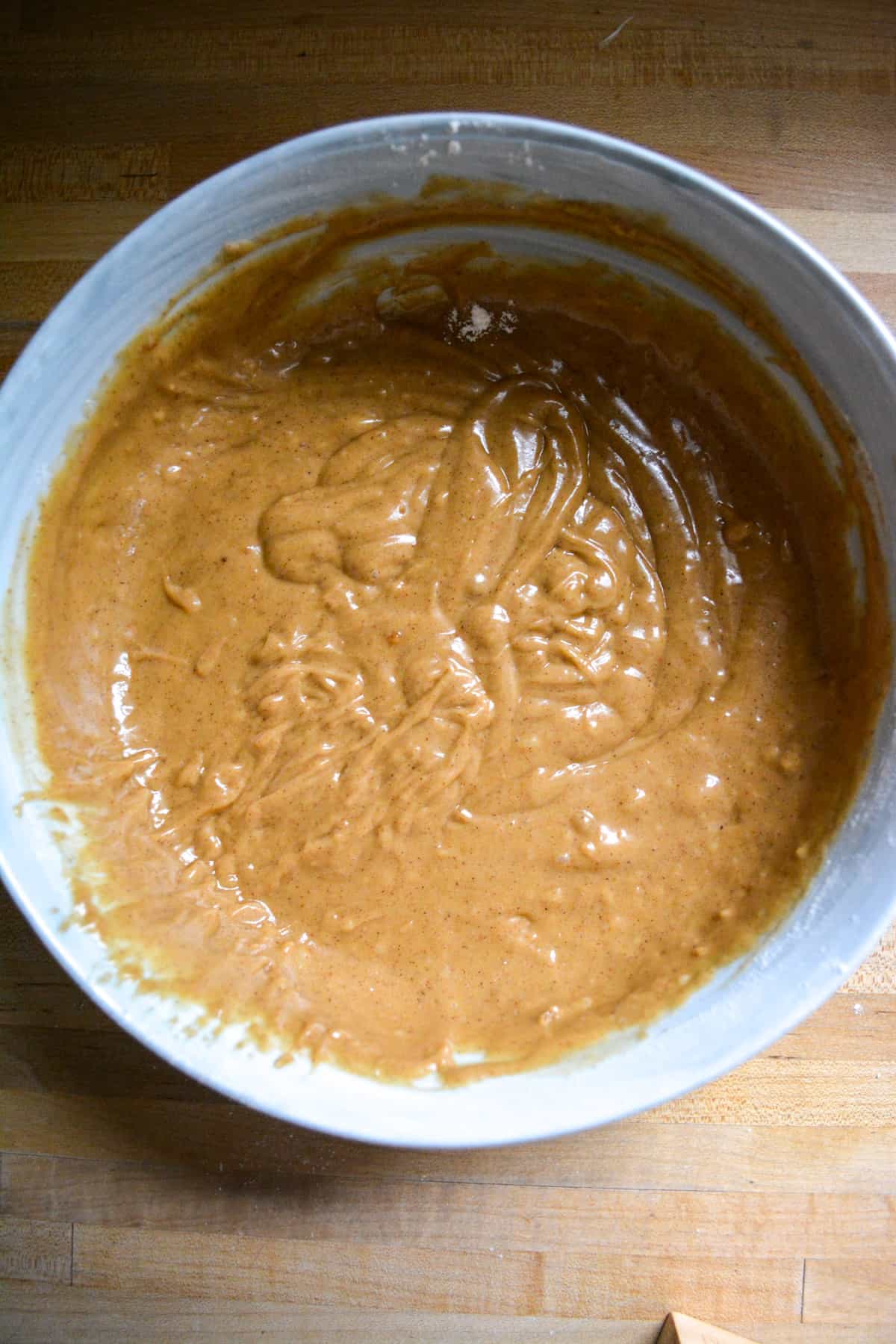 Vegan Gingerbread cake batter in a mixing bowl
