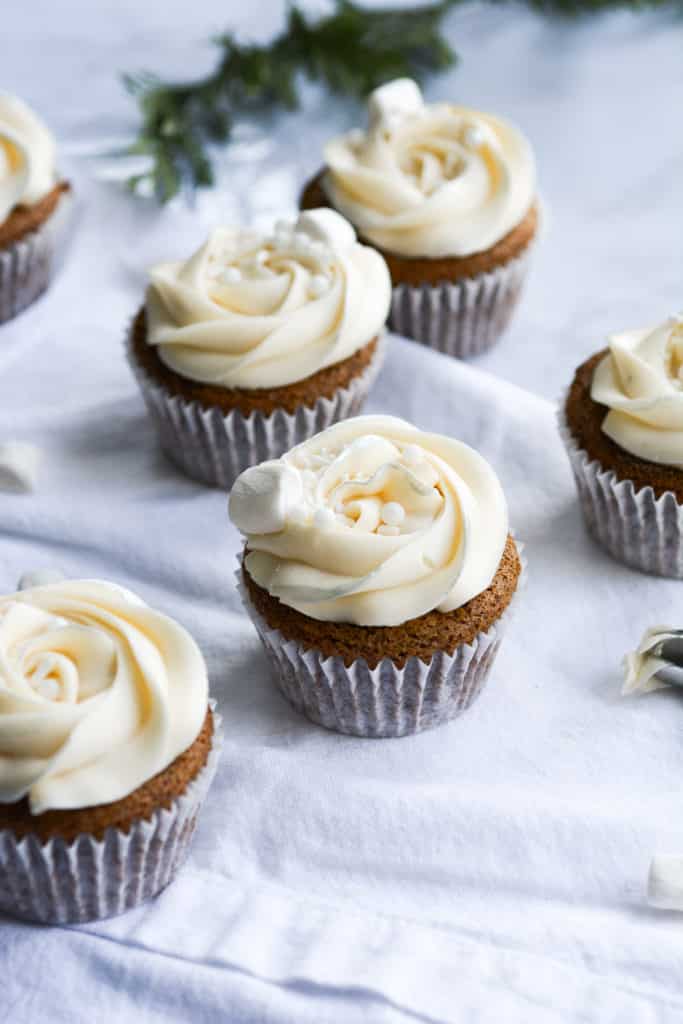 Gingerbread cupcakes on a white table