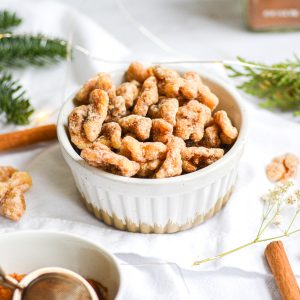 Spiced walnuts in a white ramekin