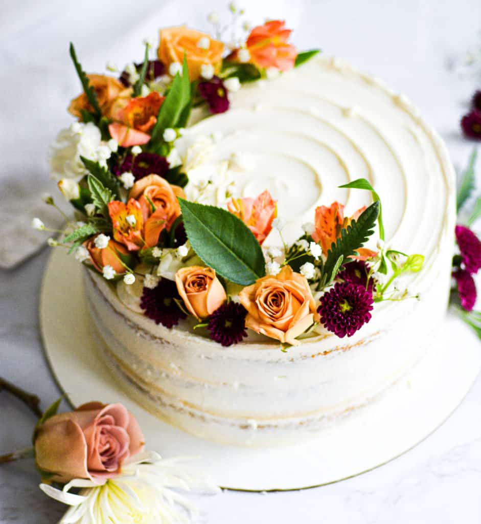 Vanilla vegan wedding cake with flowers for a Boston wedding