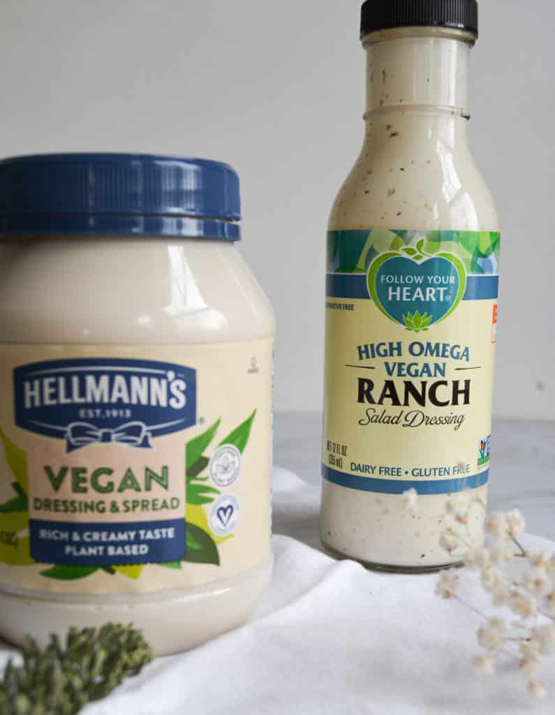 a jar of hellmanns vegan mayo and a bottle of follow your heart vegan ranch