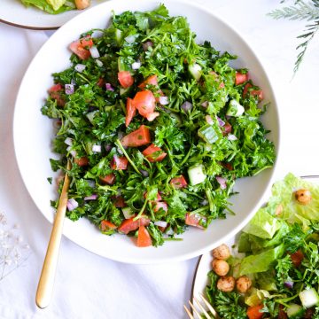 a white bowl filled with grain-free tabbouleh