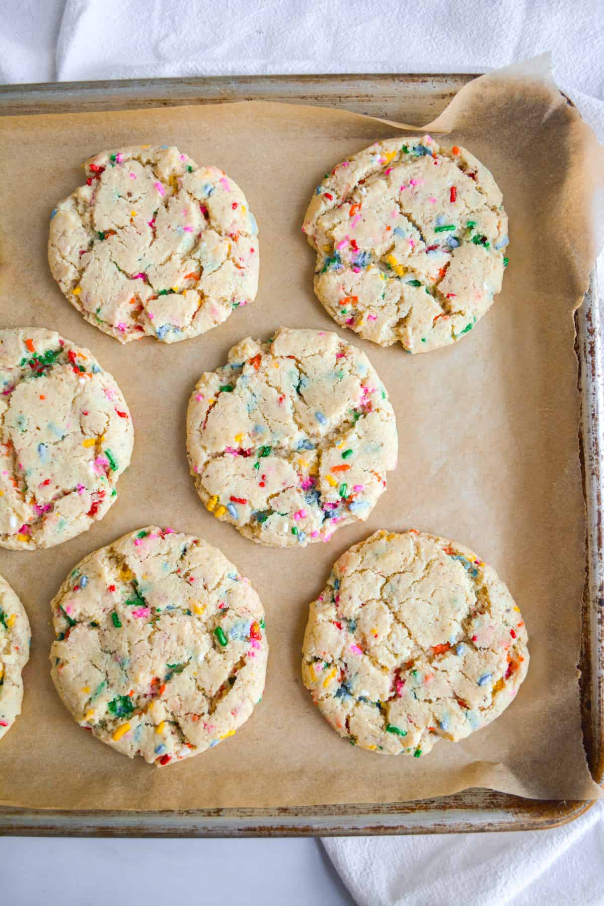 dairy free eggless funfetti cookies baked and on a cookie sheet