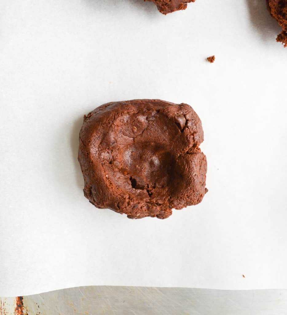 chocolate cookie dough on white parchment