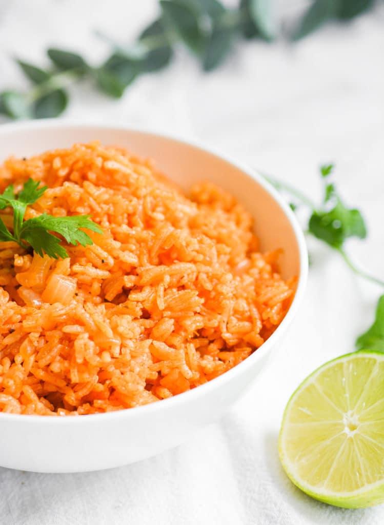 Vegetarian and Gluten Free Mexican rice in a a white bowl