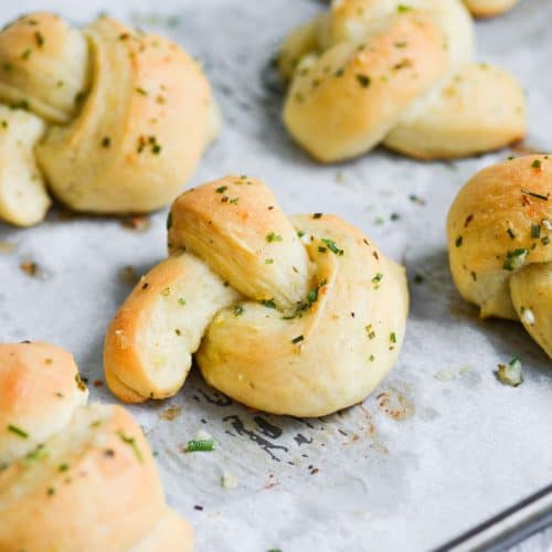 Vegan Garlic Knots on a baking tray