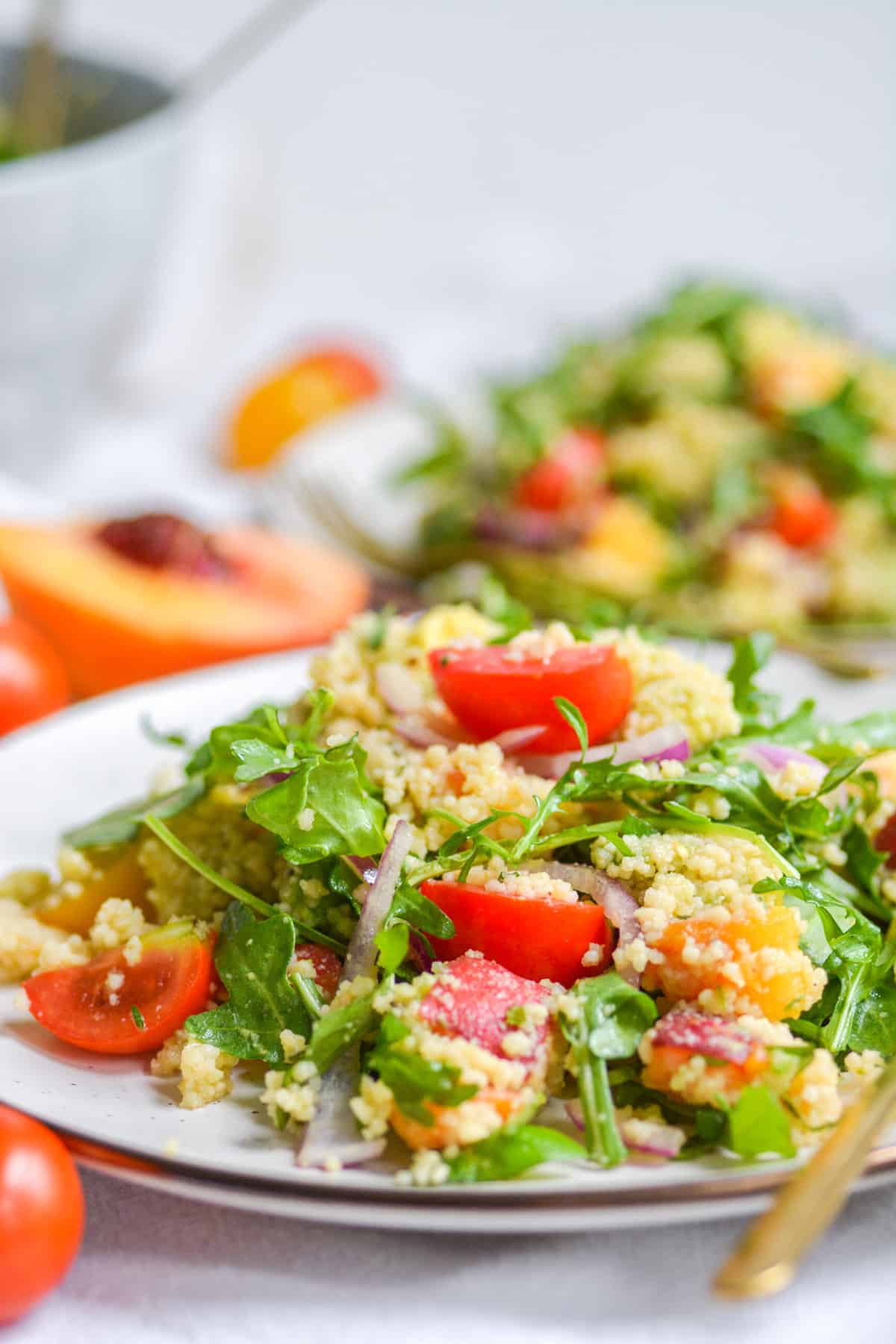 two plates of couscous salad