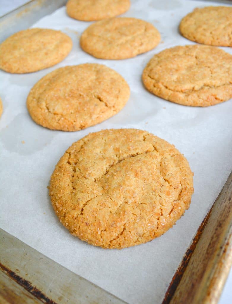 Baked vegan brown sugar cookies on a baking sheet