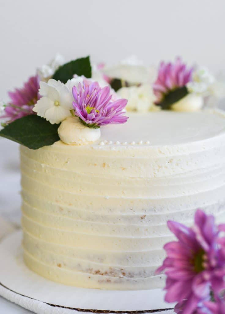 Earl Grey Lavender Cake with decorated with purple and white flowers
