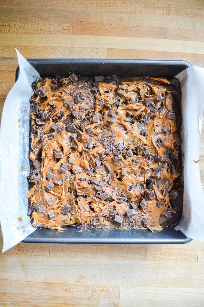 cookie butter swirled brownies topped with chopped chocolate
