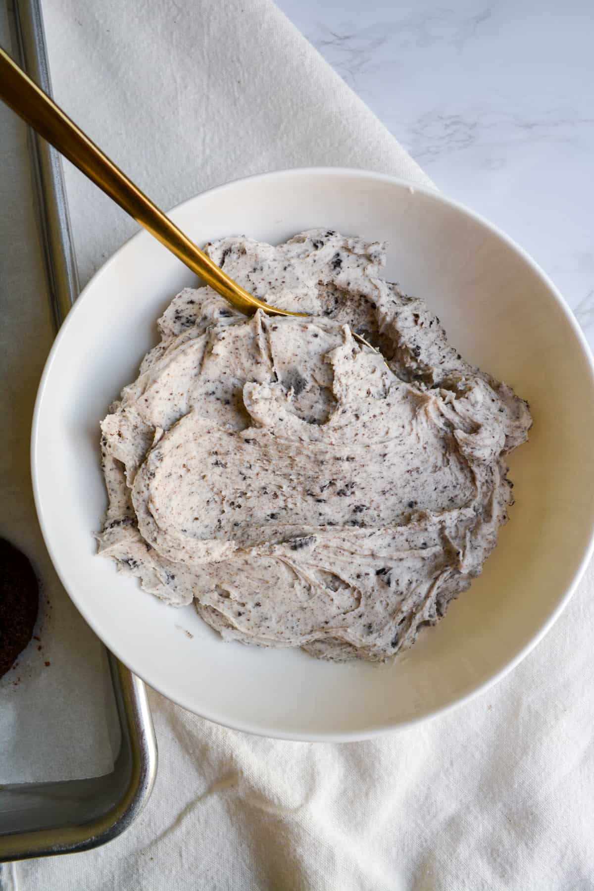 Cookies and cream filling in a white bowl