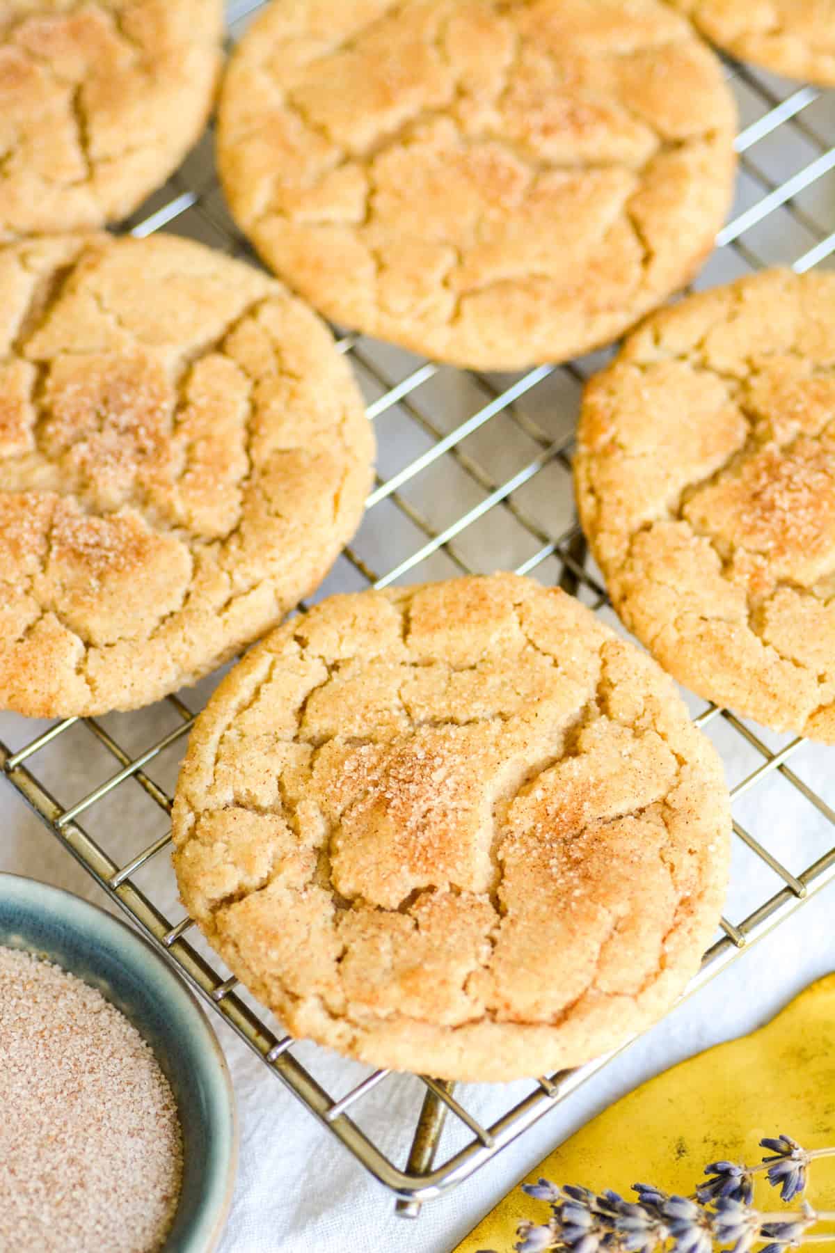 Vegan Snickerdoodle Cookies on a wire cooling rack.