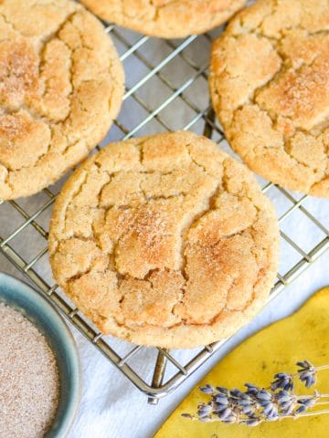 Vegan Snickerdoodle Cookies on a wire cooling rack.