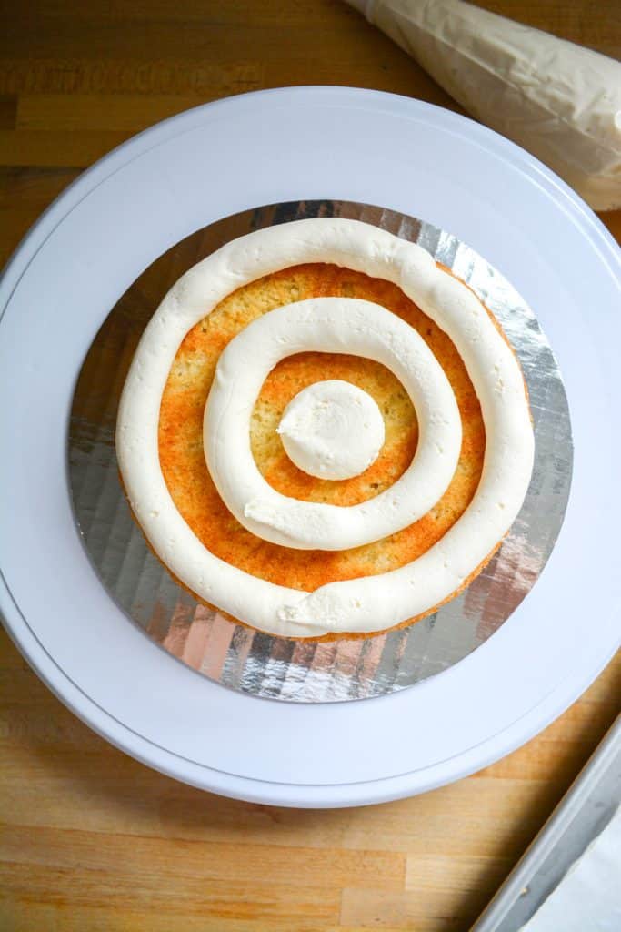 Cake with concentric circles of buttercream on top