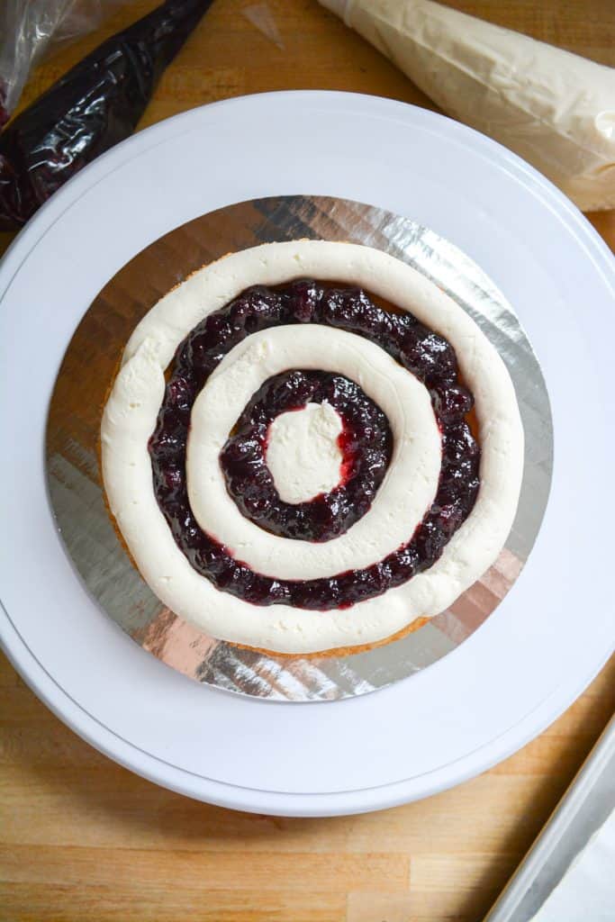 blueberry jelly inside concentric circles of buttercream