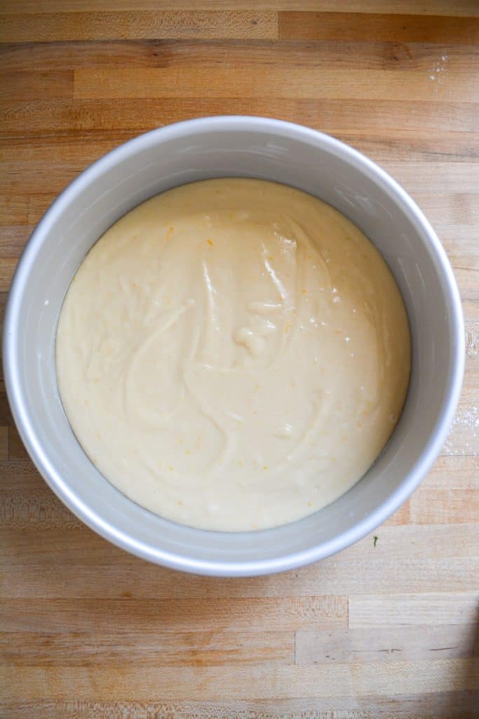 Unbaked cake batter in a cake pan
