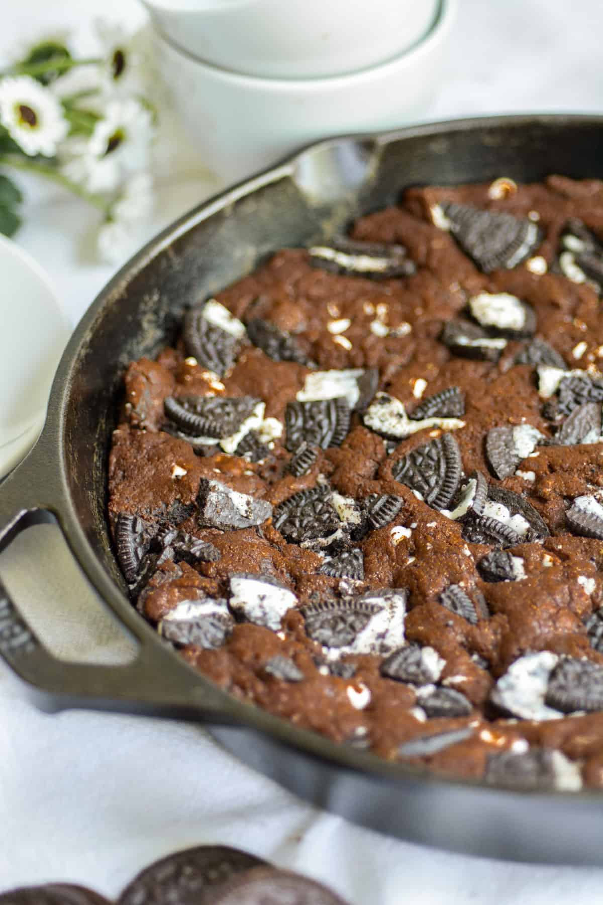 Baked cookies and cream pizookie in a skillet