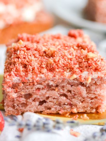 Square slice of Vegan Strawberry Crunch Cake on a cake server