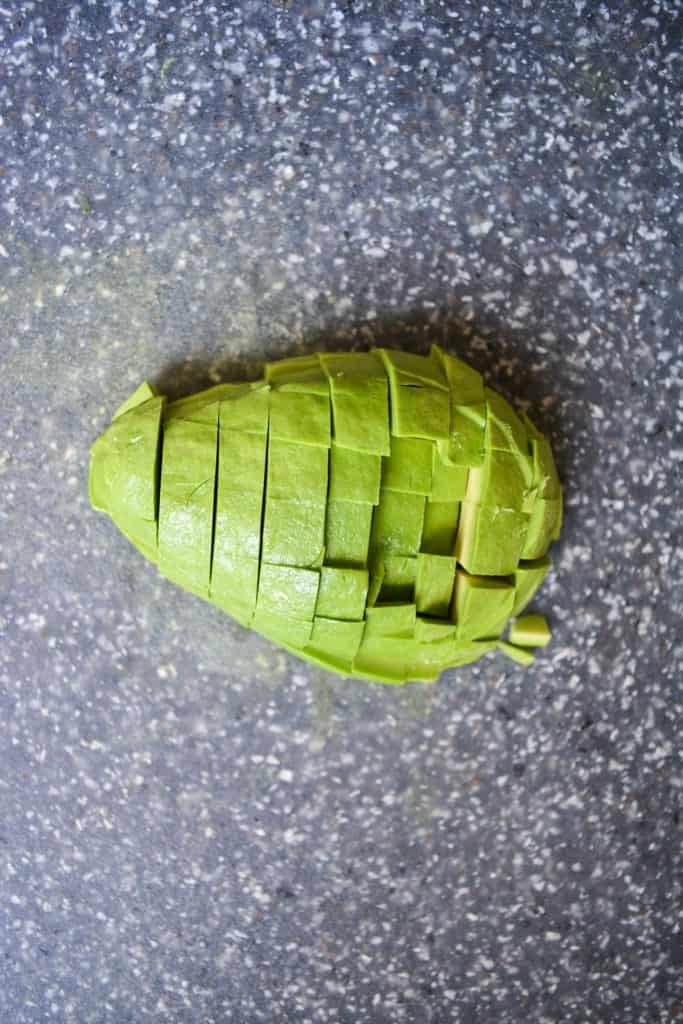avocado diced on a cutting board