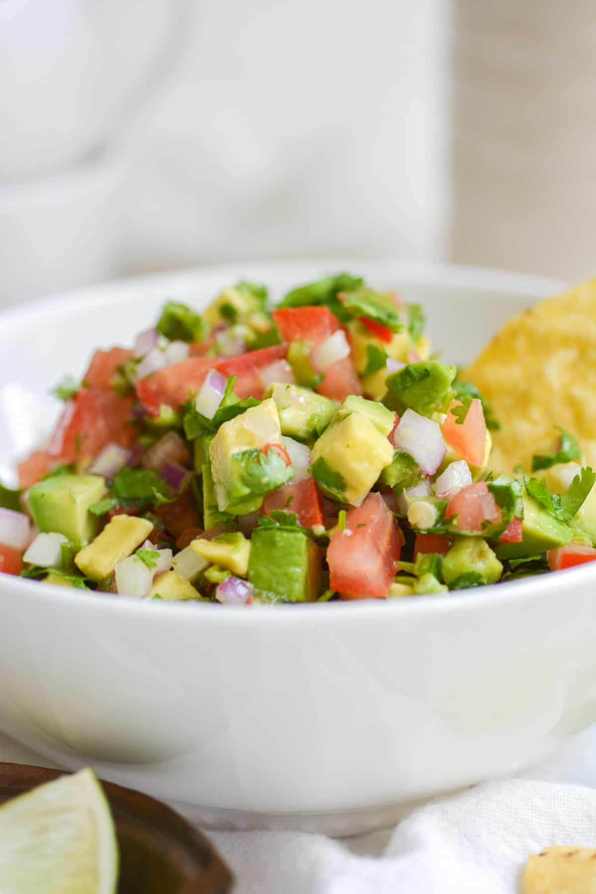 bowl of pico with a chip in it.