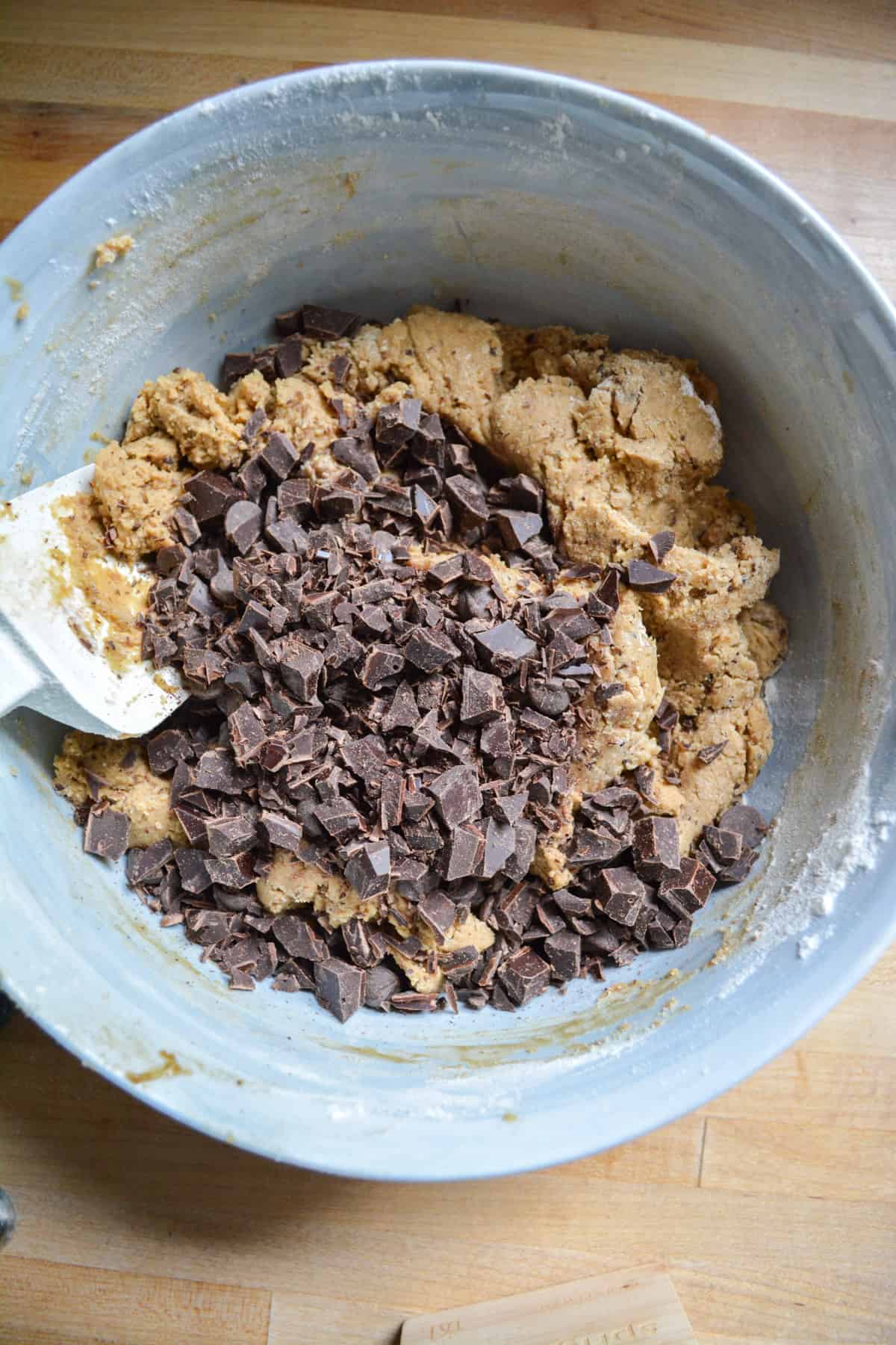 chocolate chips added into the cookie dough