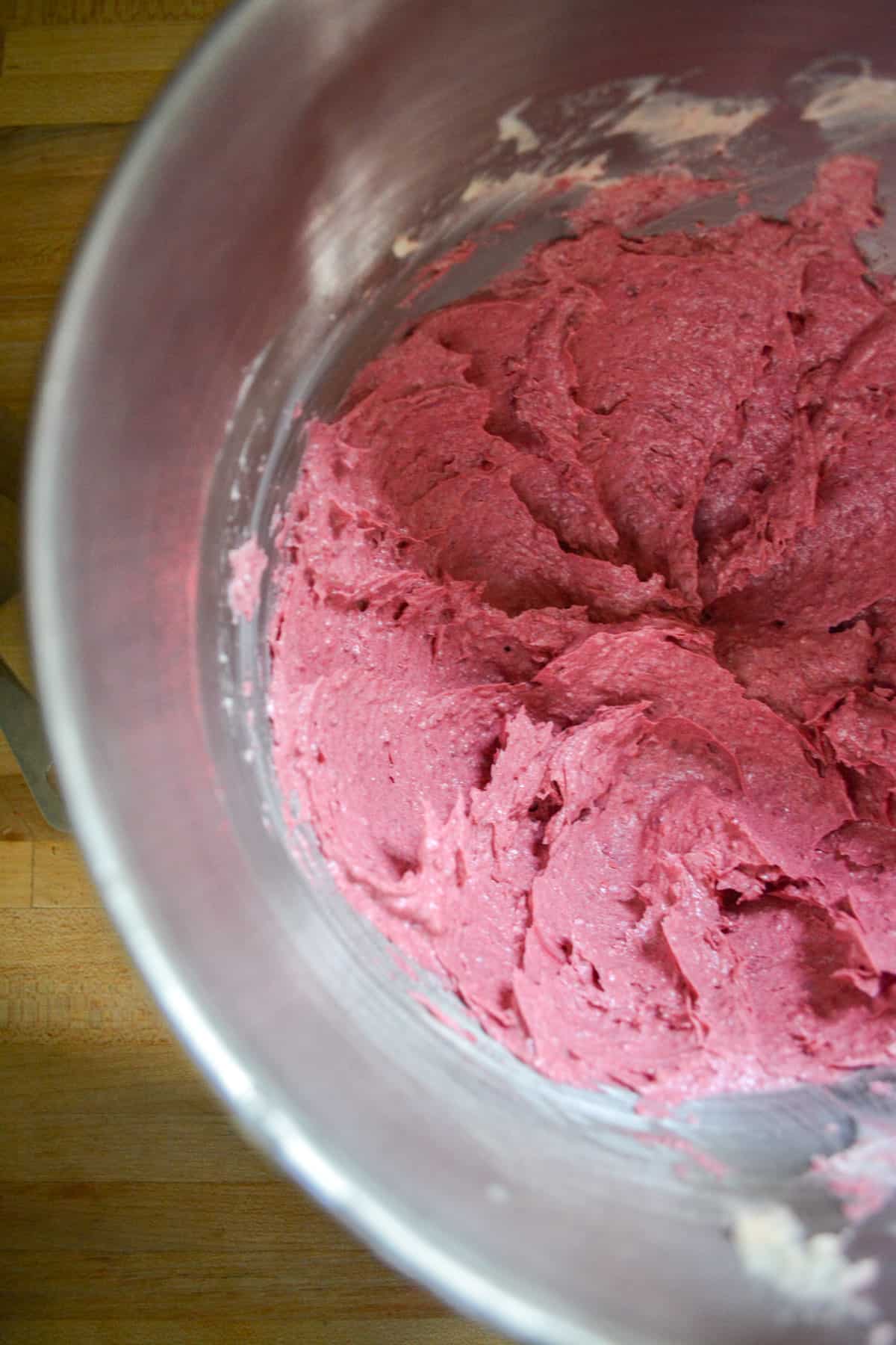 freeze-dried raspberries and vegan butter in the bowl of a stand mixer.