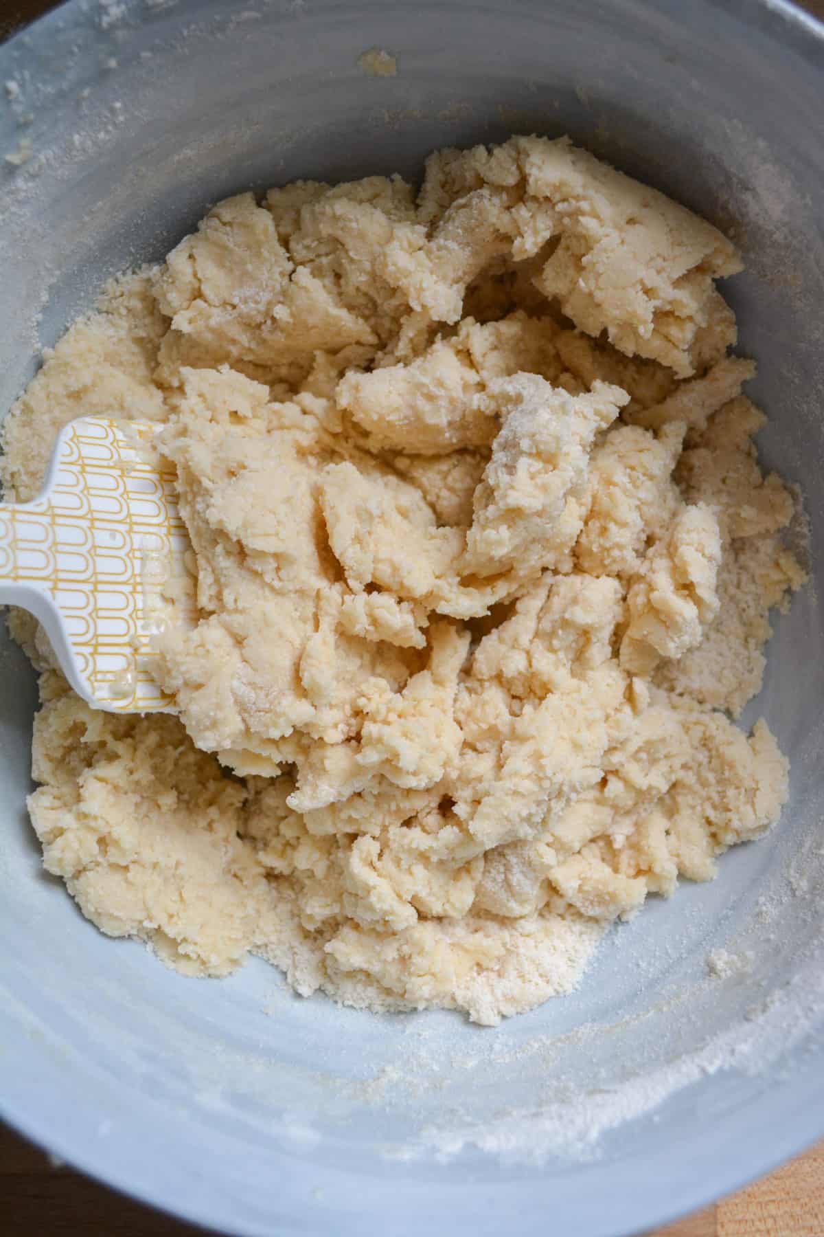Mixing the dry ingredients into the cookie dough