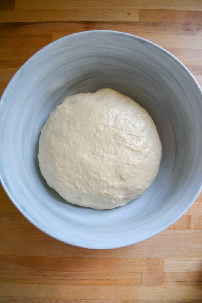 a smooth kneaded dough in a bowl.