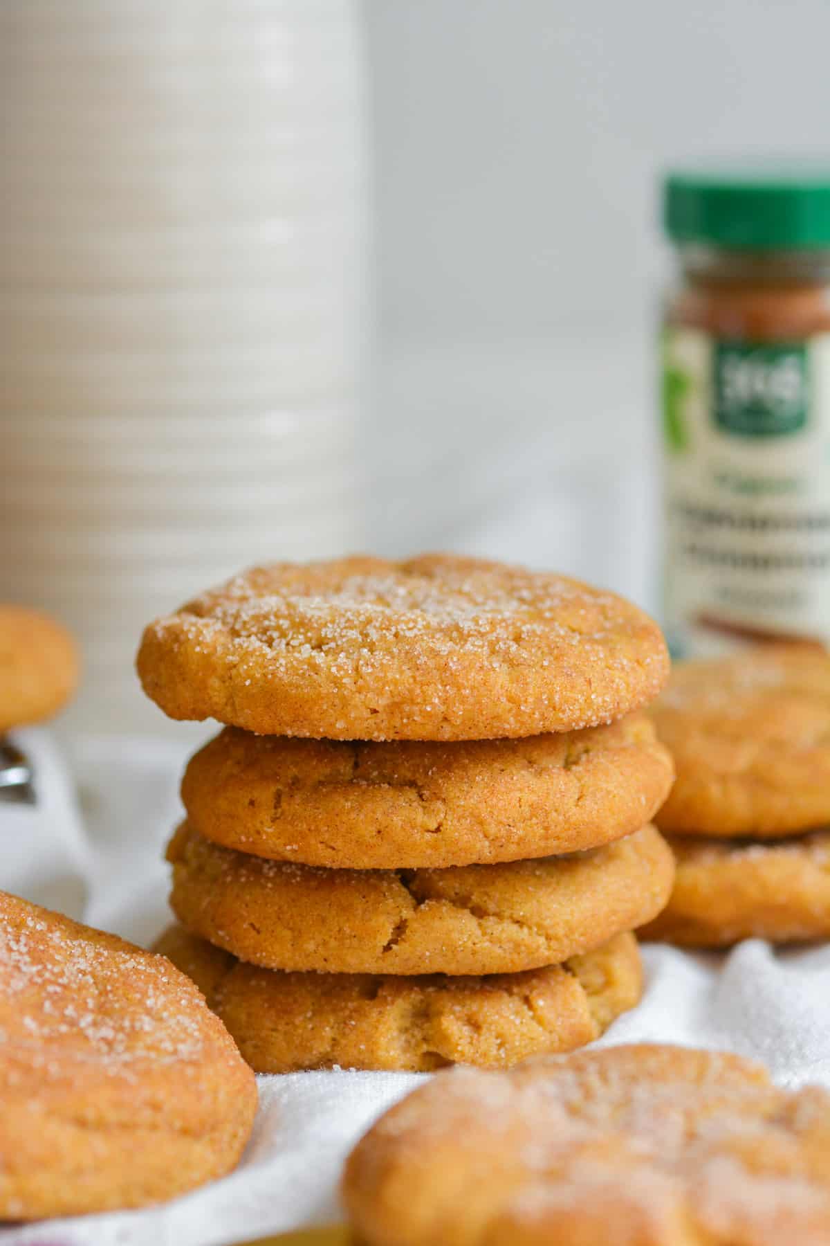 A stack of four dairy free pumpkin snickerdoodles