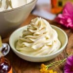 Vegan Maple Bourbon Buttercream Frosting piped into a small bowl.