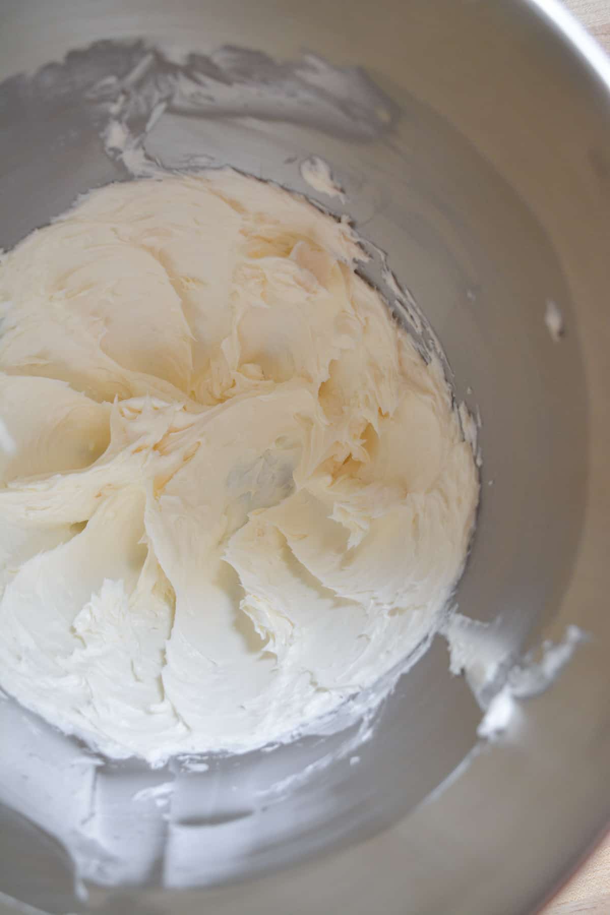 Overhead shot of vegan butter creamed in a mixing bowl.