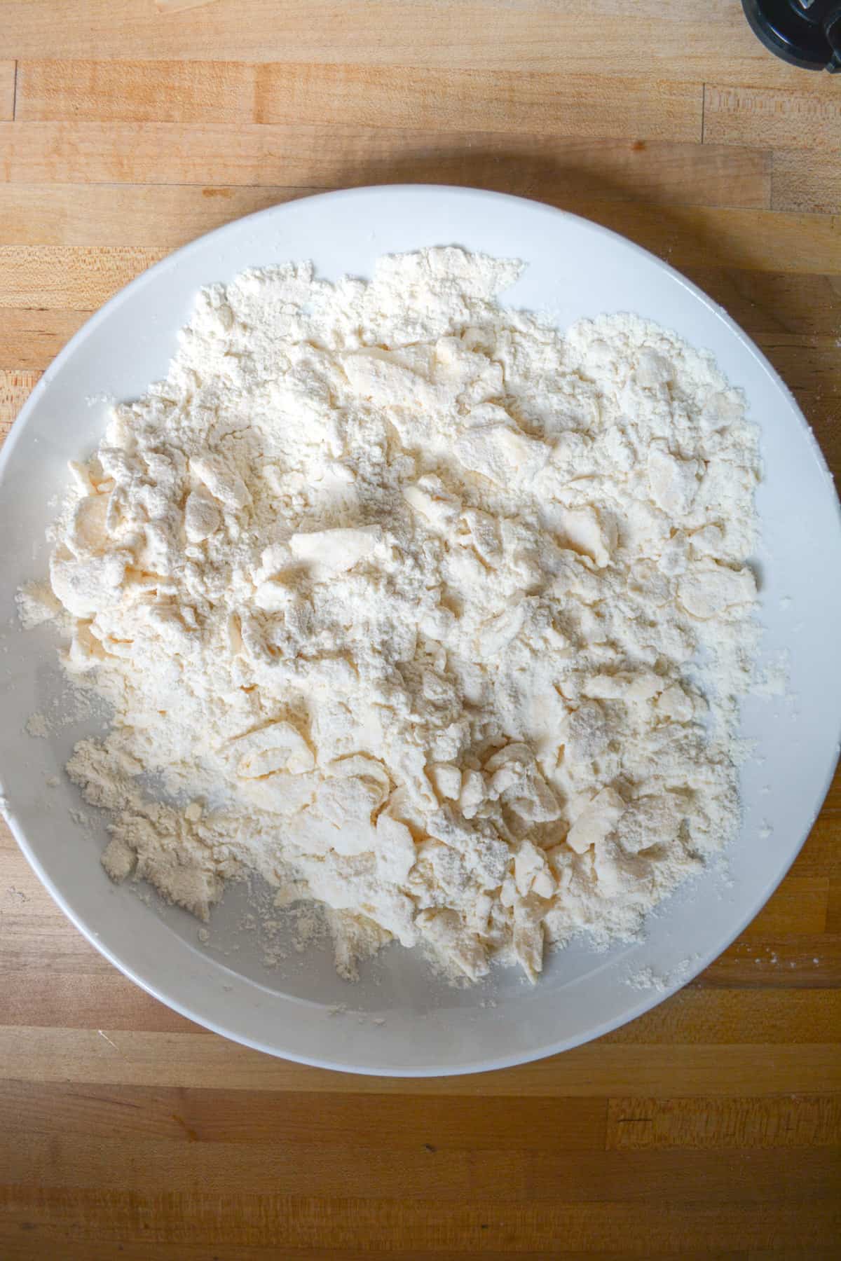 Butter cut into the dry ingredients.