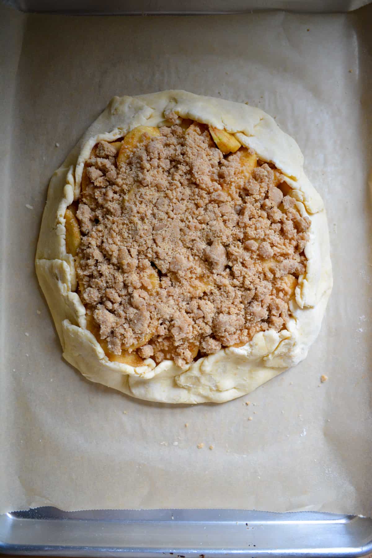 Galette topped with streusel and ready to bake.