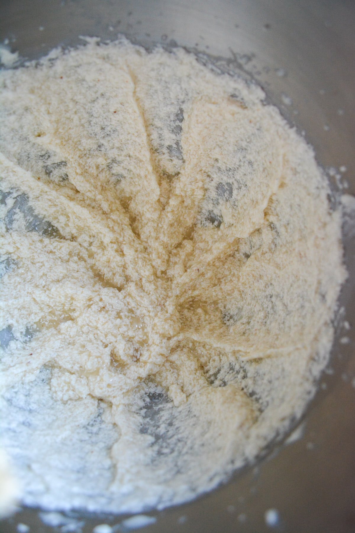 Overhead photo is liquid added into the creamed butter and sugar.