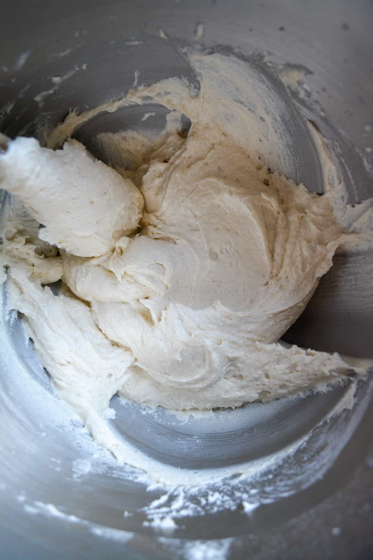 Finished batter in the bowl of a mixer.