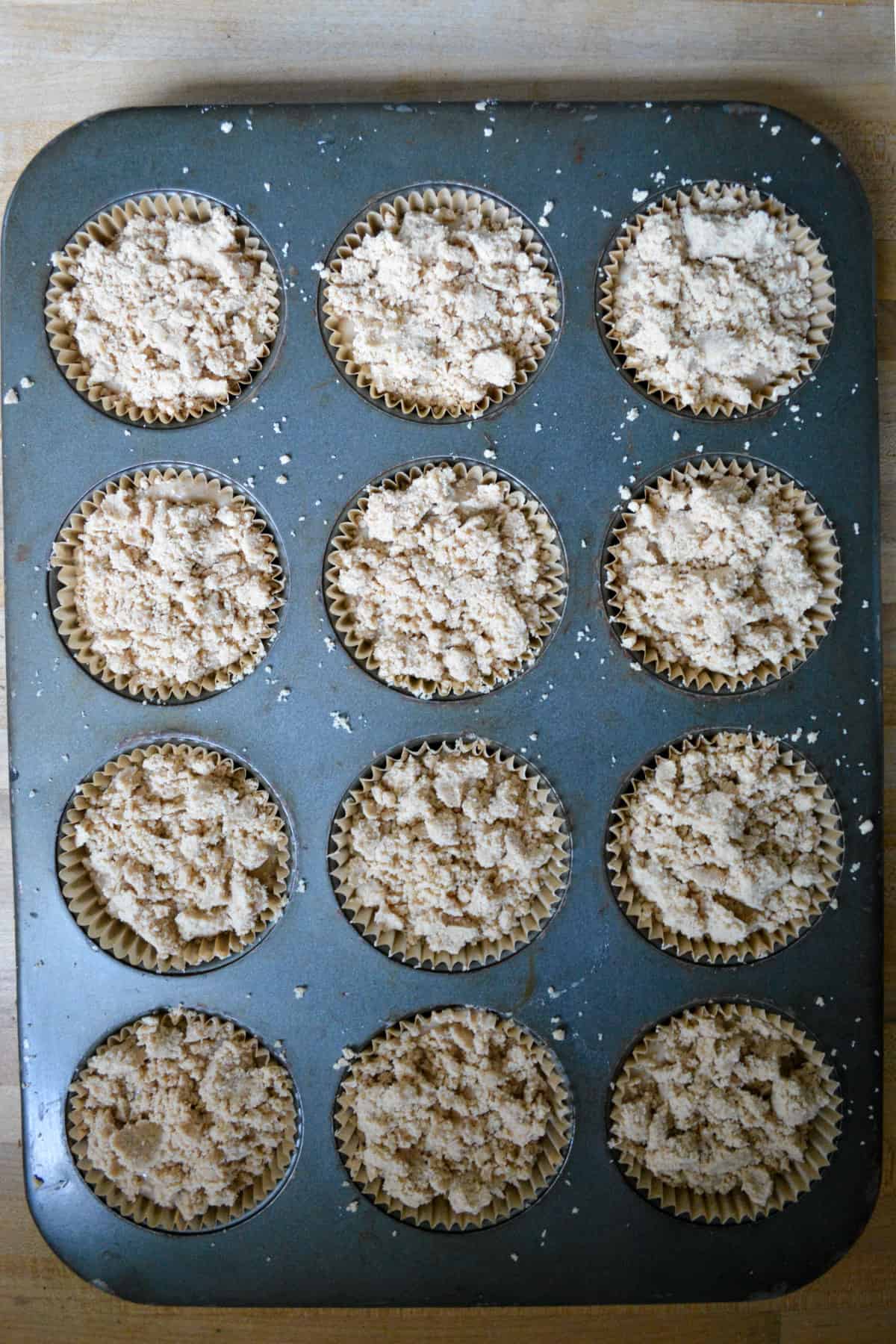 Overhead photo of vegan banana coffee cake muffins ready to be baked.