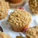 Vegan Banana Sour Cream Coffee Cake muffins on a white cloth.