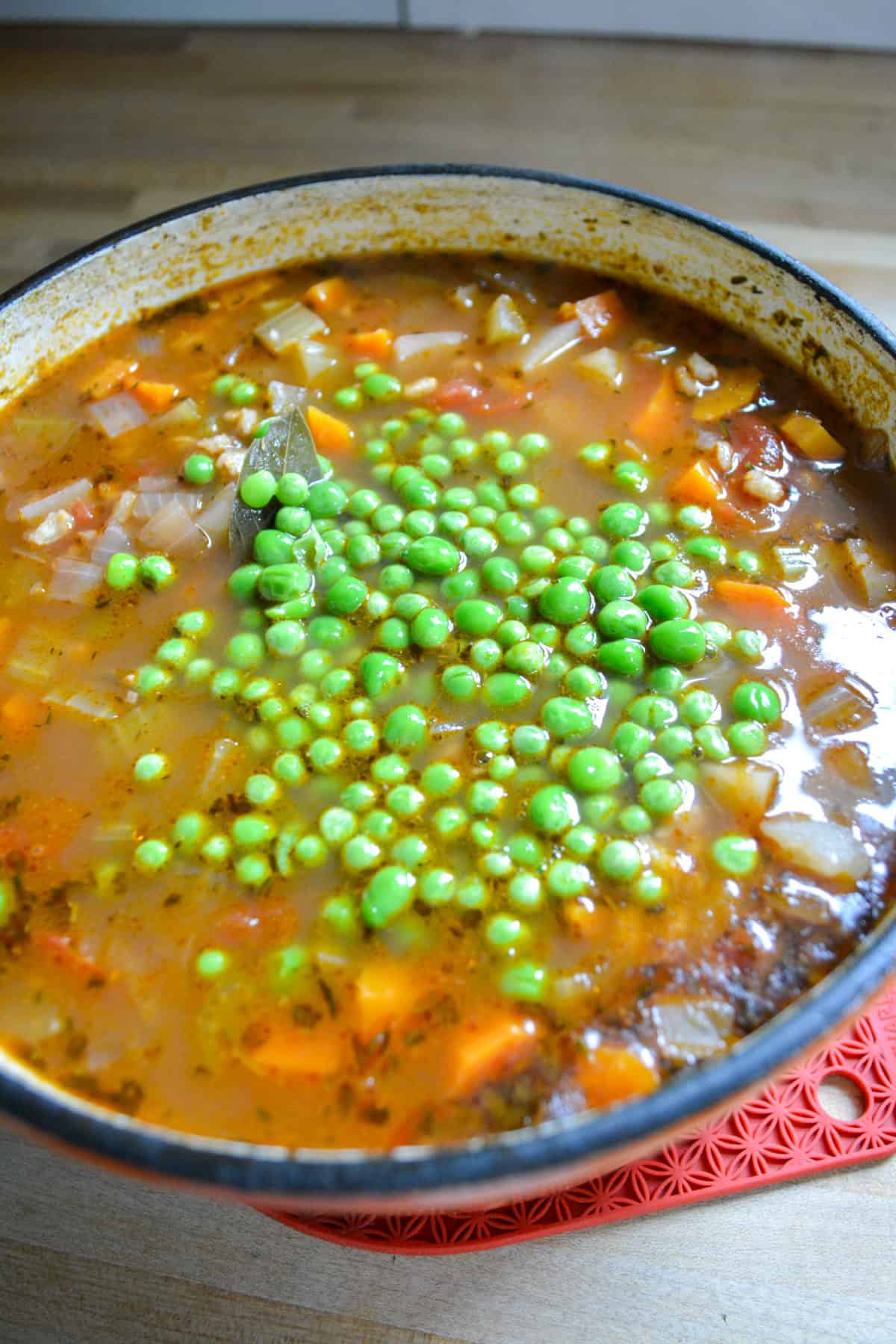 Peas added in to the finished vegan barley stew.